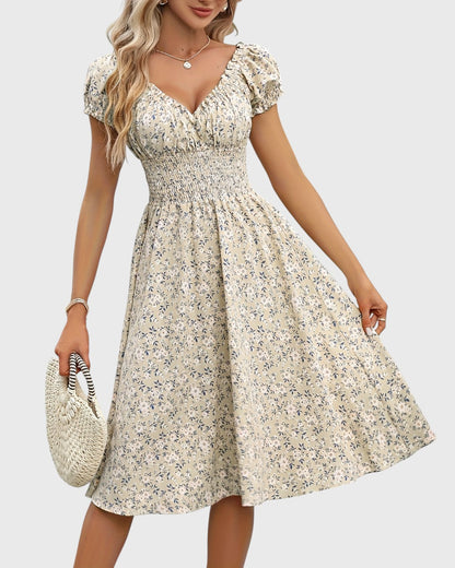 Aurore robe midi fleurie à manches bouffantes et décolleté en V
